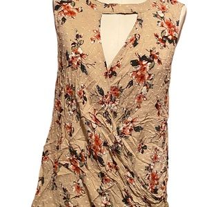 Staccato floral print sleeveless peek-a-boo neckline wrap top Size Large